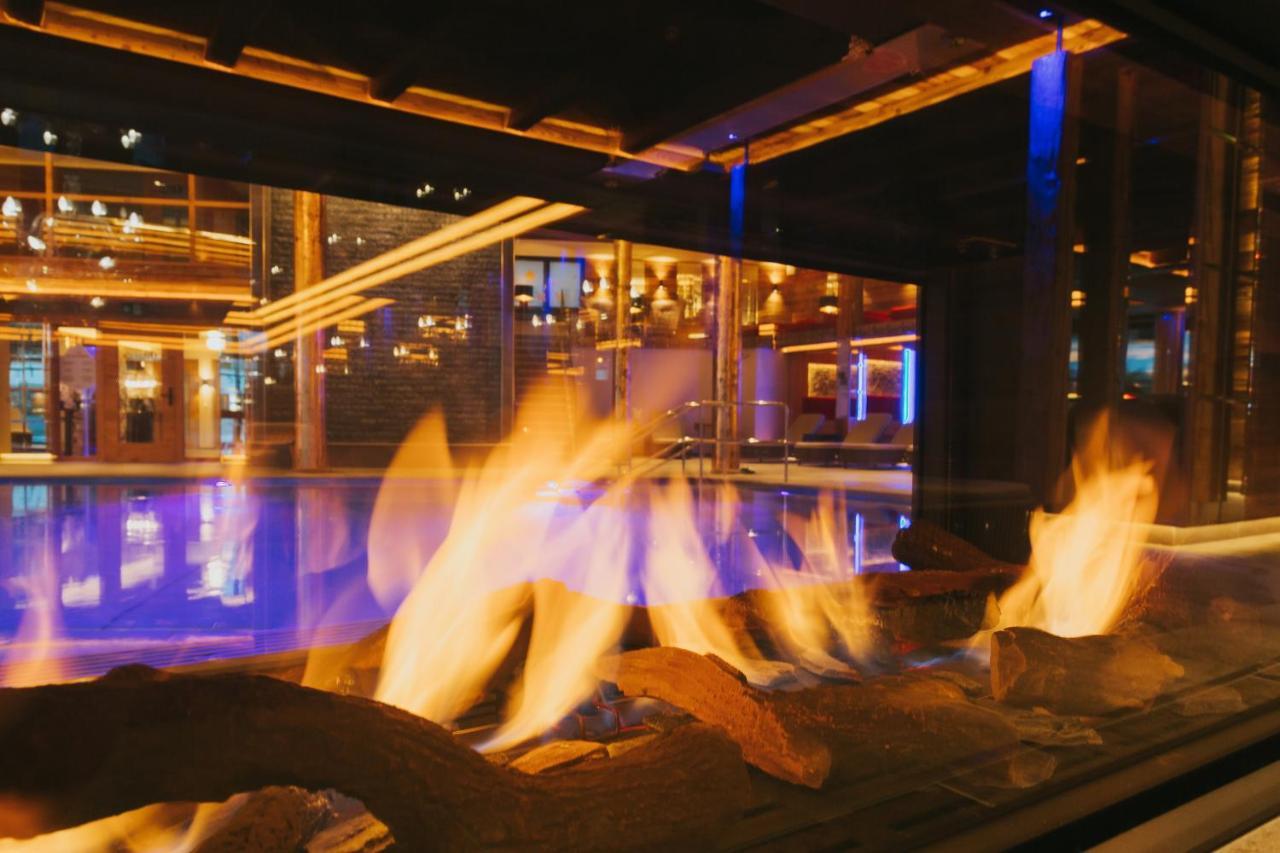 Ortner'S Resort Bad Füssing Buitenkant foto The fireplace at the lobby