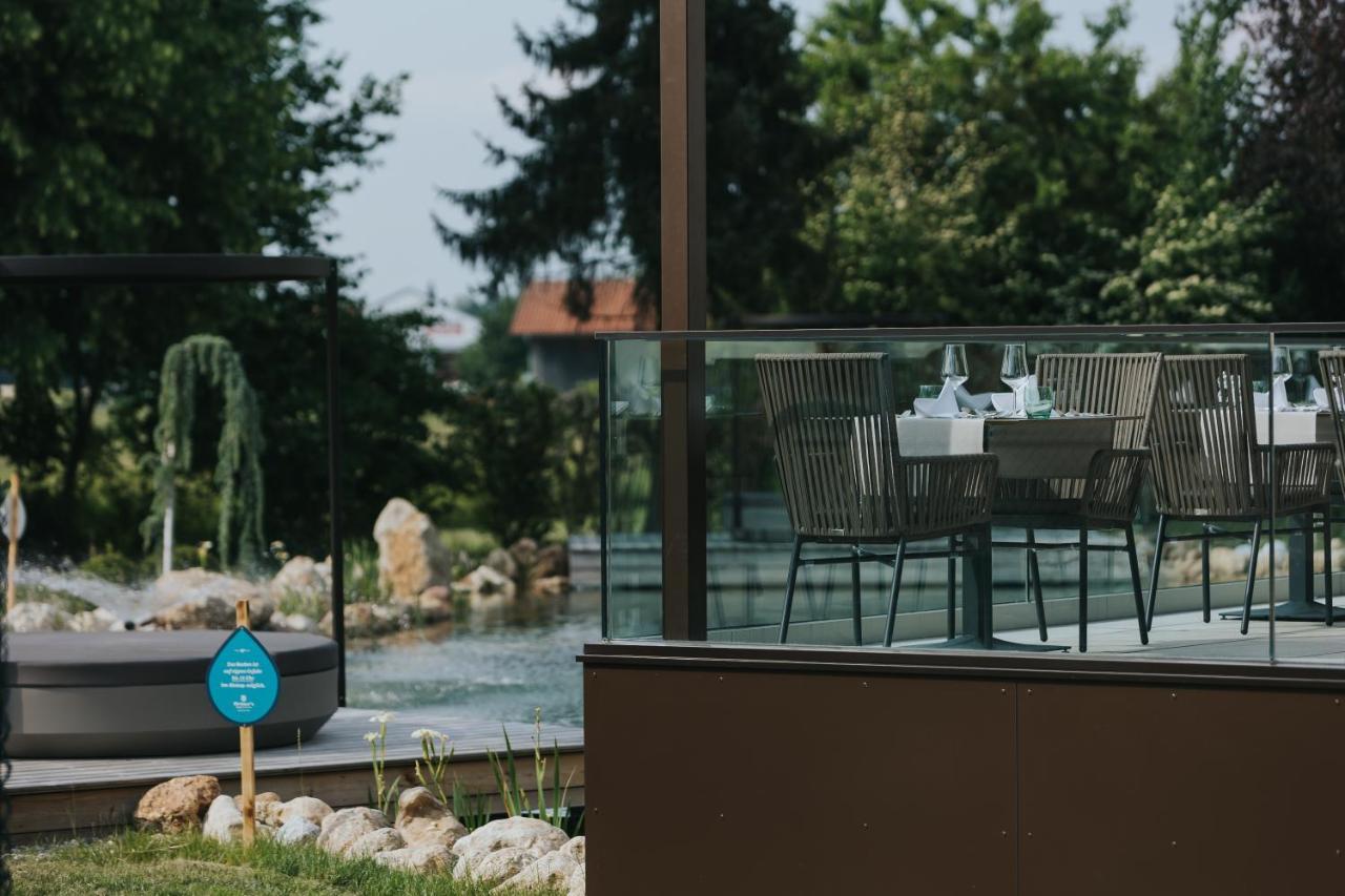 Ortner'S Resort Bad Füssing Buitenkant foto A glass balustrade